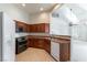The kitchen features wood cabinets, tile floors and plenty of counter space at 3975 N Hualapai Way # 212, Las Vegas, NV 89129