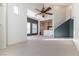 Open-concept living room boasting high ceilings, and lots of natural light at 3975 N Hualapai Way # 212, Las Vegas, NV 89129