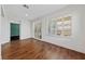 Bright bonus room with shuttered windows and beautiful laminate wood flooring at 4217 Box Canyon Falls Ave, North Las Vegas, NV 89085