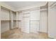 Walk-in closet featuring custom shelving and drawers for optimal storage at 4217 Box Canyon Falls Ave, North Las Vegas, NV 89085