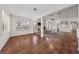 Spacious living room with columns and plenty of natural light from shuttered windows at 4217 Box Canyon Falls Ave, North Las Vegas, NV 89085