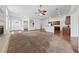 Large open living space flows into the kitchen area, great for entertaining at 4217 Box Canyon Falls Ave, North Las Vegas, NV 89085