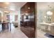 Modern bathroom featuring sleek fixtures, marble flooring, and an open concept design leading to the bedroom at 4381 W Flamingo Rd # 1504, Las Vegas, NV 89103