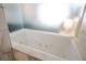 Modern tiled bathtub at 4381 W Flamingo Rd # 1504, Las Vegas, NV 89103