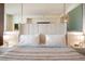 Bright bedroom featuring a large bed with a padded headboard and mirrored walls at 4381 W Flamingo Rd # 1504, Las Vegas, NV 89103