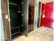 Bedroom closet with built-in organization and a view into the bathroom at 4381 W Flamingo Rd # 1504, Las Vegas, NV 89103