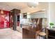 Modern kitchen featuring stainless steel appliances and a bar counter with a stool at 4381 W Flamingo Rd # 1504, Las Vegas, NV 89103