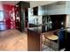 Sleek kitchen with stainless steel countertops and cabinets, and a breakfast bar at 4381 W Flamingo Rd # 1504, Las Vegas, NV 89103