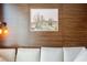 Close up of a modern living room showcasing a wood paneled wall with decorative art at 4381 W Flamingo Rd # 1504, Las Vegas, NV 89103
