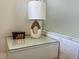 Contemporary nightstand with modern lamp and digital clock at 4381 W Flamingo Rd # 1504, Las Vegas, NV 89103