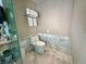 Toilet with white towels and marble backsplash at 4381 W Flamingo Rd # 1504, Las Vegas, NV 89103