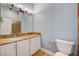 Bathroom with a single sink, vanity, and large mirror at 4775 N Grand Canyon Dr, Las Vegas, NV 89129