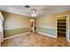 Bedroom featuring a ceiling fan, closet, and access to the ensuite bathroom at 4775 N Grand Canyon Dr, Las Vegas, NV 89129