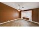 Simple bedroom featuring tile flooring, neutral paint, and a single window at 4775 N Grand Canyon Dr, Las Vegas, NV 89129