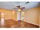 Spacious bedroom featuring neutral walls, tile floors, and access to both a bathroom and closet at 4775 N Grand Canyon Dr, Las Vegas, NV 89129