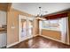 Dining area with tile floors and door to outdoor patio at 4775 N Grand Canyon Dr, Las Vegas, NV 89129