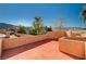 Wide roof deck overlooking mature trees and the surrounding mountain landscape at 4775 N Grand Canyon Dr, Las Vegas, NV 89129