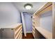 Organized walk-in closet with custom shelving and hanging space for efficient storage at 4775 N Grand Canyon Dr, Las Vegas, NV 89129