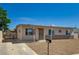 Attractive one-story house with xeriscape landscaping and covered entrance, enhanced curb appeal at 4804 Apawana Ln, Las Vegas, NV 89108