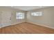 Comfortable living room with modern flooring, recessed lighting, and bright double windows that overlook the street at 4804 Apawana Ln, Las Vegas, NV 89108