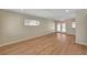 Open-concept living area with modern flooring, recessed lights, and bright window, a perfect space at 4804 Apawana Ln, Las Vegas, NV 89108