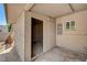 Exterior utility room with a covered patio featuring concrete flooring and a window at 4804 Apawana Ln, Las Vegas, NV 89108