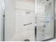 All-white bathroom showcasing a shower and bathtub with a shower-tub combo at 502 Cosmic Star Pl, Henderson, NV 89052