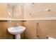 Powder room featuring pedestal sink, brushed silver faucet, and neutral paint at 502 Cosmic Star Pl, Henderson, NV 89052