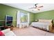Bedroom featuring neutral carpet, a queen bed, and a window with curtains at 502 Cosmic Star Pl, Henderson, NV 89052
