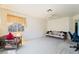 Bedroom featuring natural light, neutral carpet, and comfortable seating at 502 Cosmic Star Pl, Henderson, NV 89052