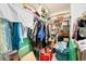 Walk-in closet filled with clothing and accessories at 502 Cosmic Star Pl, Henderson, NV 89052