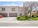 Two-story home with landscaped front yard and attached two-car garage at 502 Cosmic Star Pl, Henderson, NV 89052