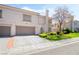 Charming two-story home with well-manicured lawn and mature landscaping at 502 Cosmic Star Pl, Henderson, NV 89052