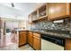 Kitchen area with tiled floors and a view into the dining room at 502 Cosmic Star Pl, Henderson, NV 89052