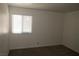 Clean bedroom with neutral paint and large window to let natural light in at 5220 Indian River Dr # 277, Las Vegas, NV 89103