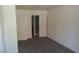Bedroom with carpet and access to the bathroom at 5220 Indian River Dr # 277, Las Vegas, NV 89103