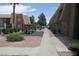 View of condo complex with playground, gravel landscaping, and walking paths at 5220 Indian River Dr # 277, Las Vegas, NV 89103