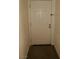 A clean white front door with secure hardware and neutral surroundings at 5220 Indian River Dr # 277, Las Vegas, NV 89103