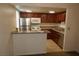 Kitchen with stainless steel appliances and wood cabinets at 5220 Indian River Dr # 277, Las Vegas, NV 89103
