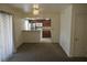 Open-concept living area with eat-in kitchen featuring stainless appliances at 5220 Indian River Dr # 277, Las Vegas, NV 89103