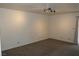 Spacious living room featuring neutral carpeting and bright lighting at 5220 Indian River Dr # 277, Las Vegas, NV 89103