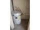 Small closet with hot water tank and shelves at 5220 Indian River Dr # 277, Las Vegas, NV 89103