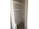 Small closet with hot water tank and shelves at 5220 Indian River Dr # 277, Las Vegas, NV 89103