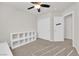 Bedroom boasts carpeted floors, a ceiling fan, and built in storage at 5252 Sunstone Mesa Dr, Las Vegas, NV 89166