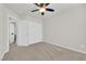 Bedroom includes carpet, ceiling fan, and ample closet space at 5252 Sunstone Mesa Dr, Las Vegas, NV 89166