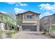 Charming two-story home with a two-car garage and a well-maintained paver driveway at 5252 Sunstone Mesa Dr, Las Vegas, NV 89166