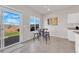 Kitchen nook with outdoor view through sliding glass door to patio and backyard at 5252 Sunstone Mesa Dr, Las Vegas, NV 89166