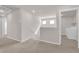 Upstairs landing with natural light and laundry room access at 5252 Sunstone Mesa Dr, Las Vegas, NV 89166