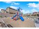 Neighborhood playground includes colorful slides and seating for neighborhood enjoyment and community interaction at 5252 Sunstone Mesa Dr, Las Vegas, NV 89166