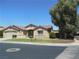 Well-maintained single-story home with a three car garage and manicured lawn at 5488 Apron Ct, Las Vegas, NV 89122
